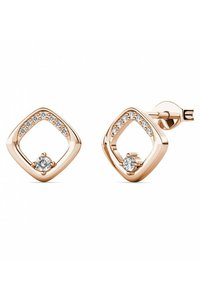 Orecchini in oro rosa a forma di diamante, con una pietra centrale trasparente e una fila di pietre più piccole lungo il bordo superiore. Finitura lucida.