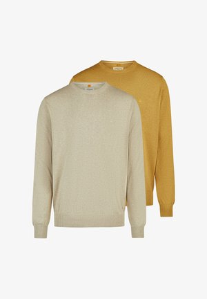 To langærmede crewneck-trøjer, den ene beige foran og den anden sennepsgul bagved, vist på hvid baggrund.