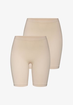 Beige nahtlose Shorts aus dehnbarem Material, mit einem mittelhohen Bund und einem glatten, körpernahen Schnitt mit Beinöffnungen.