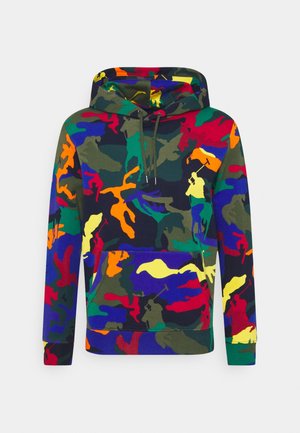 Hooded sweatshirt featuring a multicolored camouflage pattern in blue, green, red, orange, and yellow. Soft fabric with a front pocket.