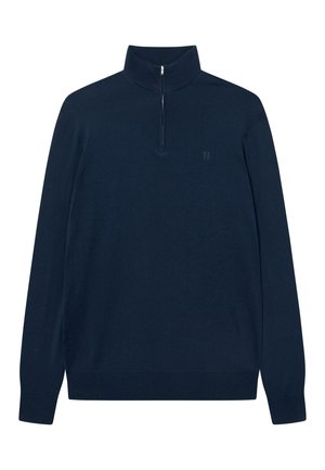 Mornarko modra, pulover z dolgimi rokavi in polovičnim zadrgo na ovratniku. Narejen iz mehkega materiala, z diskretnim logotipom na levem prsnem delu. Gladka tekstura.