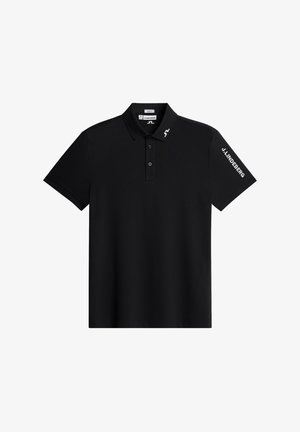 Polo noir slim fit avec trois boutons, avec le texte « J.LINDEBERG » sur la manche droite et le logo sur le col.