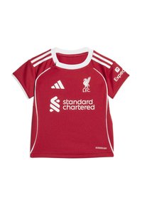 Röd barntröja med vita detaljer, kort ärm, rundad halsringning, Liverpool FC-logotyp och sponsorlogotyper. Tillverkad av ventilerande material.