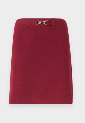 Knee-length burgundy skirt with belt loops and a gold-tone horsebit buckle detail at the waistband.