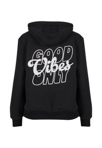 Black hooded sweatshirt featuring a large white graphic text "GOOD VIBES ONLY" in varying fonts. Made from soft, textured fabric.