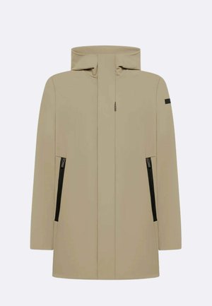 Giacca impermeabile beige con collo alto, chiusura frontale con zip, tasche laterali con cerniere nere e design minimalista.