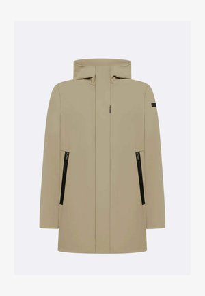 Chaqueta impermeable beige con cuello alto, cierre frontal con cremallera, bolsillos laterales con cremalleras negras y diseño minimalista.