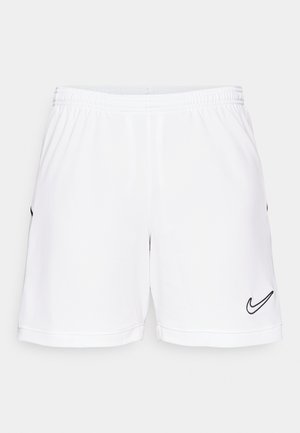 Baltas sporta šorts ar elastīgu jostasvietu, ar melnu Nike swoosh logotipu apakšējā kreisajā pusē un smalku teksturētu apdari.