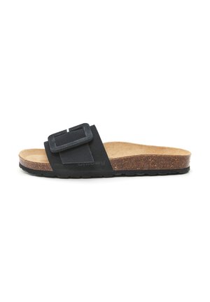 Sandale noire à glissière avec une large sangle et un détail de boucle rectangulaire. Comprend une semelle en liège et une semelle en caoutchouc texturé pour une meilleure adhérence.