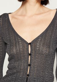 Guess Kardigan - black