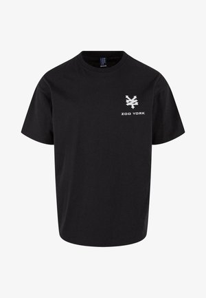 Must musta t-särk lühikeste varrukatega, ümarate kraega ja vasakul rinnal valge "ZOO YORK" logo koos embleemiga.