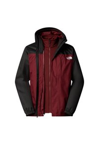 Giacca impermeabile con corpo bordeaux, maniche nere, chiusura con zip, cappuccio regolabile e polsini elastici. Include diverse tasche frontali.