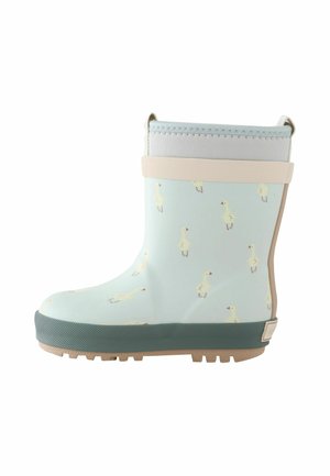 Botte en caoutchouc bleu clair avec une semelle texturée vert foncé, présentant un motif de petits canards jaunes. Comprend une bande beige en haut.
