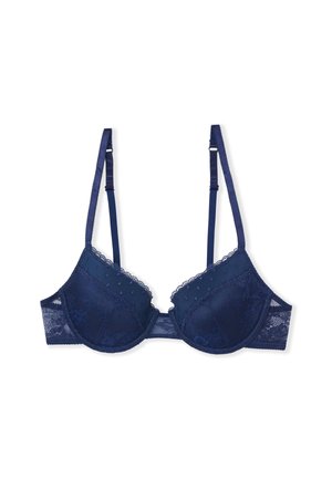 Granatowy biustonosz z koronki z fiszbinami, regulowanymi ramiączkami i falbankowym brzegiem miseczek, ułożony płasko na białym tle.