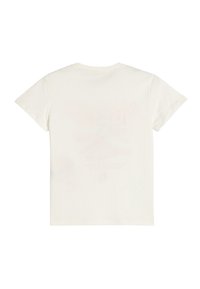 Camiseta de manga corta de color crema, hecha de algodón y con cuello redondo; presenta un estampado gráfico desvanecido en la parte posterior.