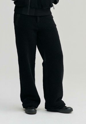 SATELLITE - Trousers - black