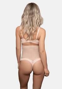 Shapewear beige senza cuciture a vita alta con spalline regolabili, una texture liscia e un design della schiena a media altezza.