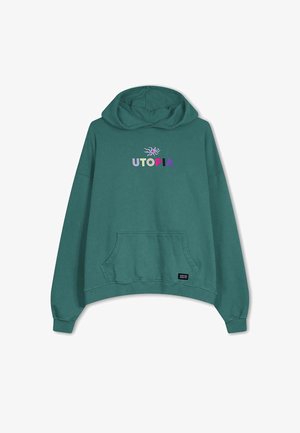 Un sweat à capuche teal avec une poche avant, présentant un texte "UTOPIA" multicolore et un design graphique au-dessus. Tissu doux, coupe décontractée, poignets côtelés.