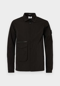 VINNIE - Waterproof jacket - black