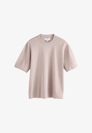 Maglietta beige a maniche corte realizzata in tessuto morbido. Presenta un collo tondo, una vestibilità rilassata e cuciture minime per un aspetto uniforme.