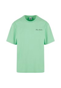 Mint green cotton T-shirt featuring short sleeves, crew neck, and a small black "Kani Studios" logo on the front left side.