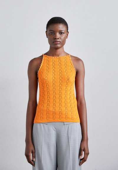 Orange knitted tank top with a ribbed texture and intricate patterns, featuring beaded accents along the neckline and shoulder straps.
