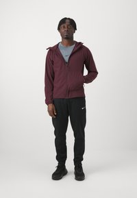 Nike Performance UNLIMITED - Träningsjacka - burgundy crush/black