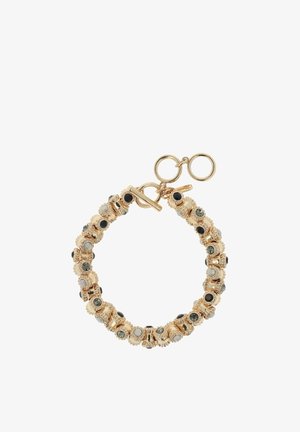 Armband in Goldoptik mit runden Perlen, die mit klaren, grünen und schwarzen Edelsteinen verziert sind. Das Design verfügt über einen Knebelverschluss für sicheren Halt.