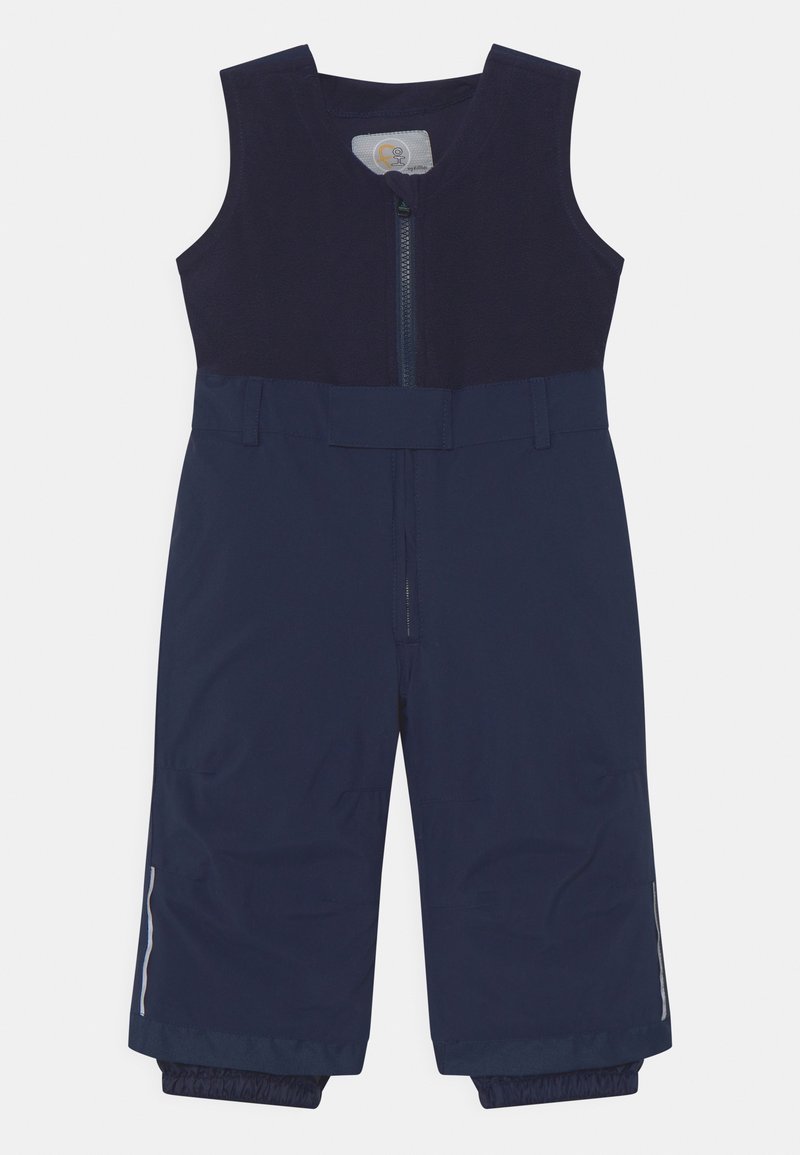 Salopette imperméable bleu marine avec fermeture éclair à l'avant, design sans manches, poignets élastiques aux chevilles et accents réfléchissants sur les côtés.