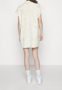 Nike Sportswear Žerzejové šaty - beige