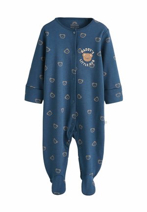 Blaues Baumwollbaby-Overall mit einem Allover-Bärenmuster, Druckknöpfen und dem Text "Papás kleiner Bär." Fußdesign für Wärme.