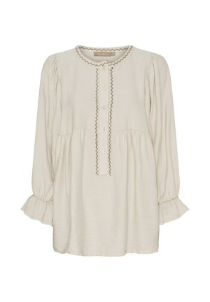 Lys beige langærmet bluse med rund halsudskæring, knaplukning og broderede detaljer ned ad fronten og ved ærmekanterne.