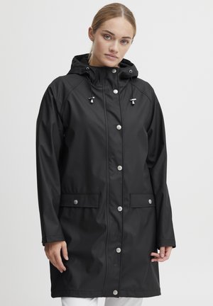 Black raincoat with a fitted shape, button and zipper closure, adjustable drawstring hood, and front pockets with snap fasteners.