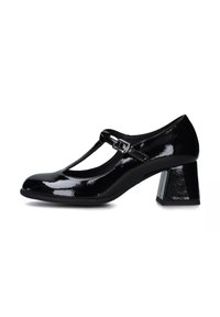 Le scarpe Mary Jane in vernice nera presentano una punta arrotondata, una fascia a T con fibbia e un tacco chunky e quadrato. Texture liscia e finitura lucida.