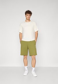 Champion TRAINING CREWNECK  - Camiseta deportiva - offwhite