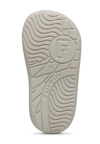 Weißer Gummisohle mit strukturiertem Muster, das Falcotto-Logo tragend, runde Form und eine glatte Kante. Beinhaltet die Zahl '19' in Relief.