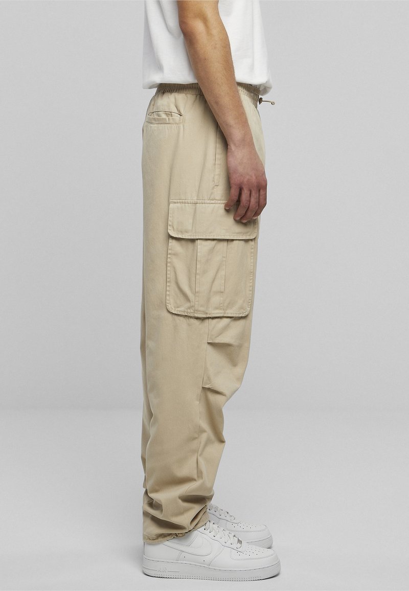 Karl Kani RUBBER SIGNATURE PANTS UNISEX - Cargo hlače - beige
