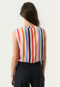 Sleeveless blouse with multicolored vertical stripes in pink, orange, blue, white, and black. Smooth fabric, round neckline, back view.