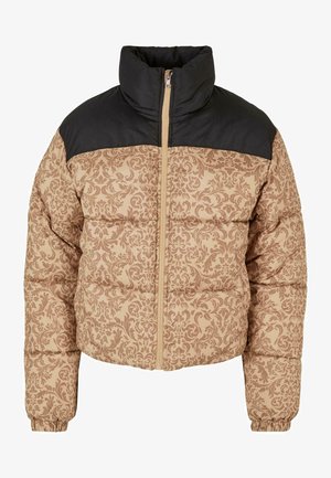 Pufferjakke med svart nylon øverste del og beige stoff med blomsterdesign, glidelås lukking og elastiske mansjetter.