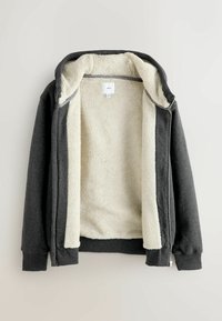 Grau-zipper Kapuzenpullover mit einem flauschigen beigen Innenfutter, ausgestattet mit langen Ärmeln, einer gefütterten Kapuze und gerippten Bündchen und Saum. Etiketten sichtbar im Inneren.