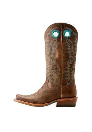 Bruine leren cowboylaars met turquoise decoratieve stiksels en uittrekgaten vlak bij de bovenkant, met een gestapelde hak en puntige neus.