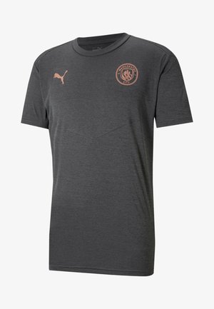 Dark gray Manchester City t-shirt with rose gold Puma logo and club crest on the chest, featuring a round neck and short sleeves.