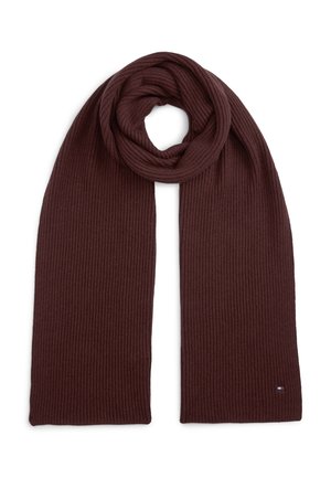 Dunkelbrauner gerippter Strickschal, zu einer Schlaufe gefaltet, mit kleinem rechteckigem Logo nahe dem unteren Rand auf weißem Hintergrund.
