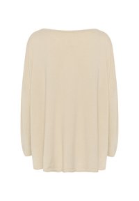 Beige übergroßer Pullover aus einem weichen, strukturierten Stoff. Mit weitem Boot-Ausschnitt und überschnittenen Schultern, locker geschnitten und ohne Muster.