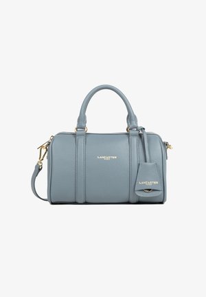 Blue leather Lancaster handbag with two handles, detachable shoulder strap, gold hardware, and embossed brand logo on front and tag.