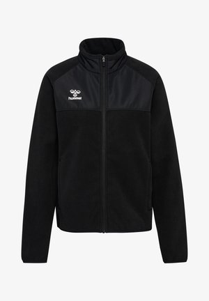 Zwarte fleecejack met hoge kraag, ritssluiting aan de voorkant en gestructureerde schouderpanelen. Voorzien van een wit logo op de linkerborst.