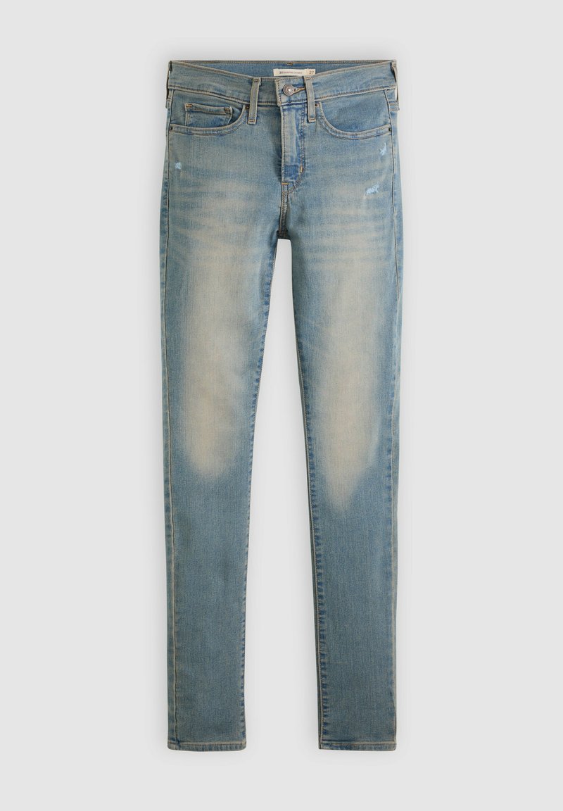 Lyseblå skinny-fit jeans med let slid og falmen på forreste lår, fem-lomme design, knap- og lynlåslukning.