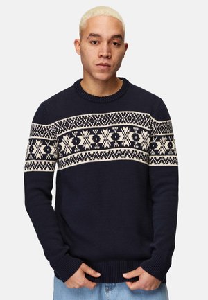 Marineblauer Strickpullover mit einem hellbeigen nordischen Muster über der Brust. Verfügt über einen Rundhalsausschnitt sowie gerippte Bündchen und Saum.