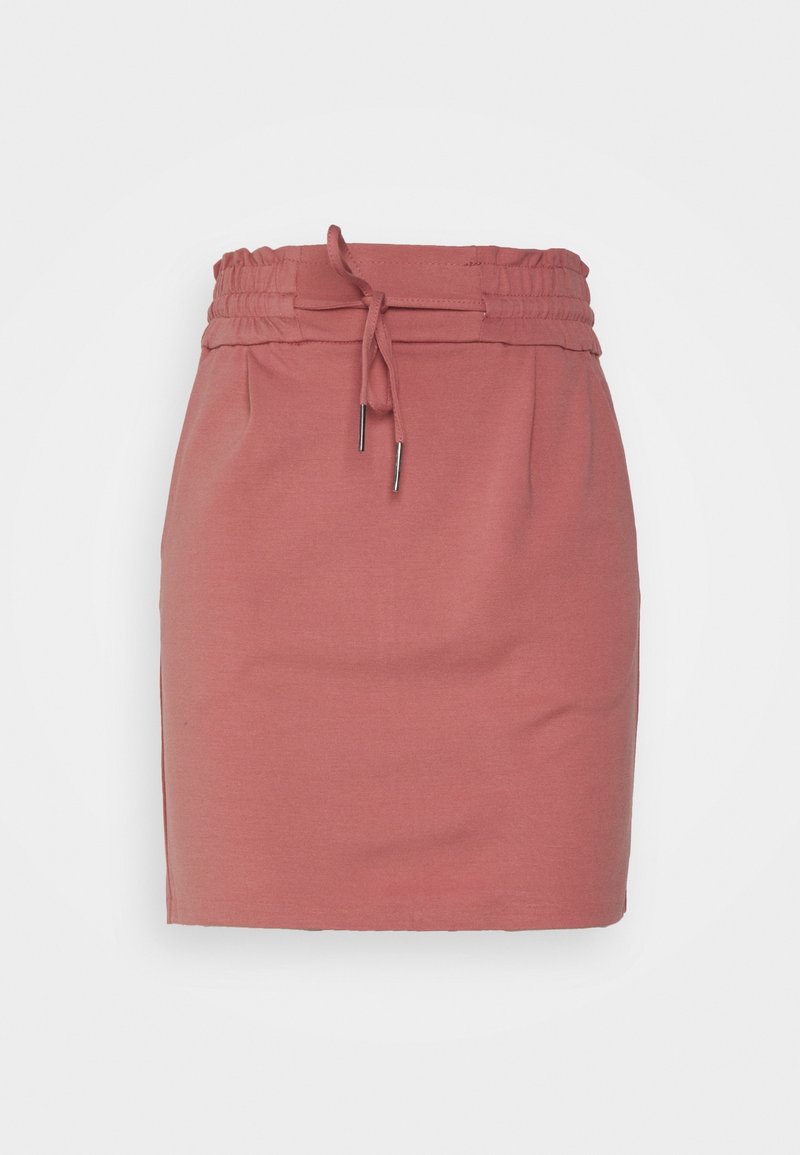 Jupe rose poudré longueur genou avec taille élastique et cordon noué, présentée sur un fond clair uni.