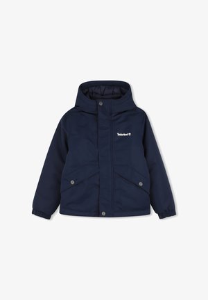 Veste enfant bleu marine à capuche avec poches à boutons-pression et logo Timberland sur la poitrine.